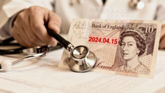 UK pound sterling banknote and calendar for NHS pay rise.